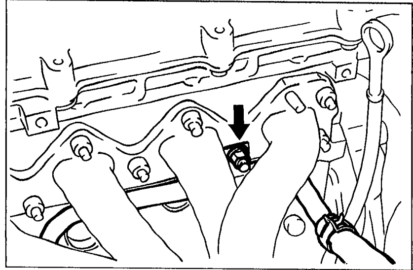 Close-up view of exhaust manifold area with an arrow pointing to the exhaust manifold nut to be removed for water bypass pipe access.