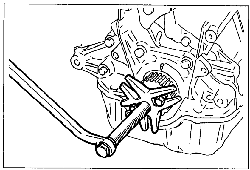 Removing the timing belt pulley with a steering wheel puller. Shows puller arms on the pulley at the engine front.