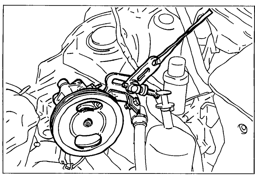 P/S oil pump photo showing the pump still attached with hoses connected, viewed from the engine bay.