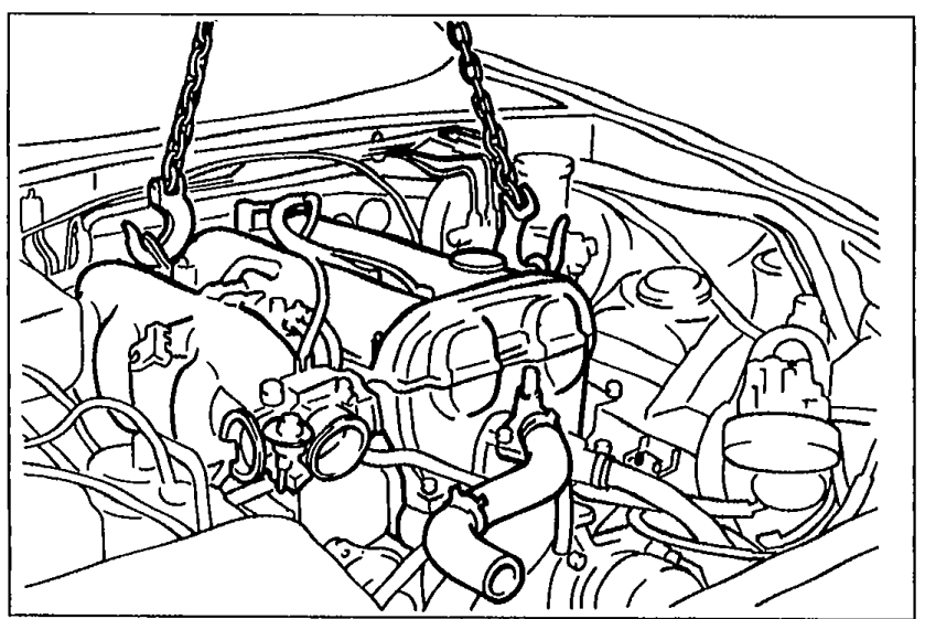 Engine and transmission assembly being lifted out of the engine bay as a unit with a hoist sling.