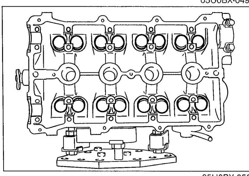 Top view of cylinder head with HLA (Hydraulic Lash Adjuster) locations visible in the valve buckets.