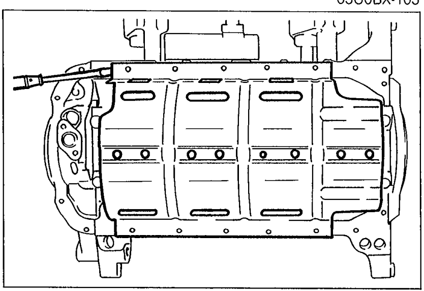 Oil pan baffle inside the engine — view of the baffle plate with horizontal slots, showing screwdriver insertion point between the cylinder block and the baffle to separate them.
