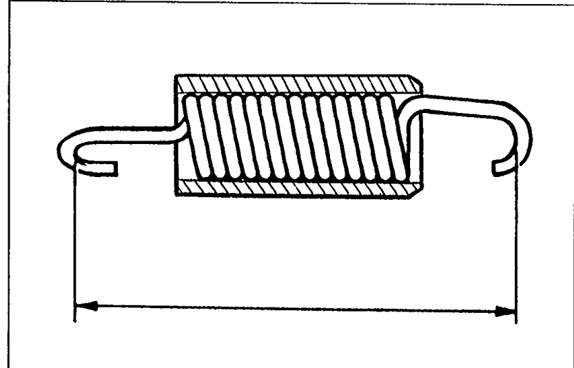 Tensioner spring (coil tension spring with hooked ends) laid horizontally with measurement arrow indicating the free length to be measured end-to-end.