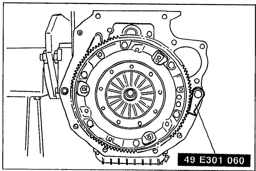 Flywheel with the SST (49 E301 060) attached, used to hold the flywheel/crankshaft. Label '49 E301 060' is visible on the tool.