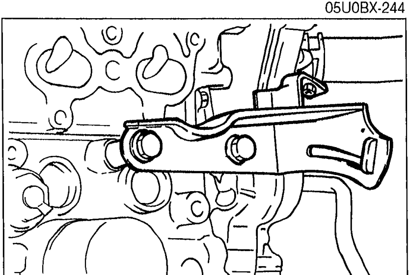 Alternator bracket installed on the engine block.