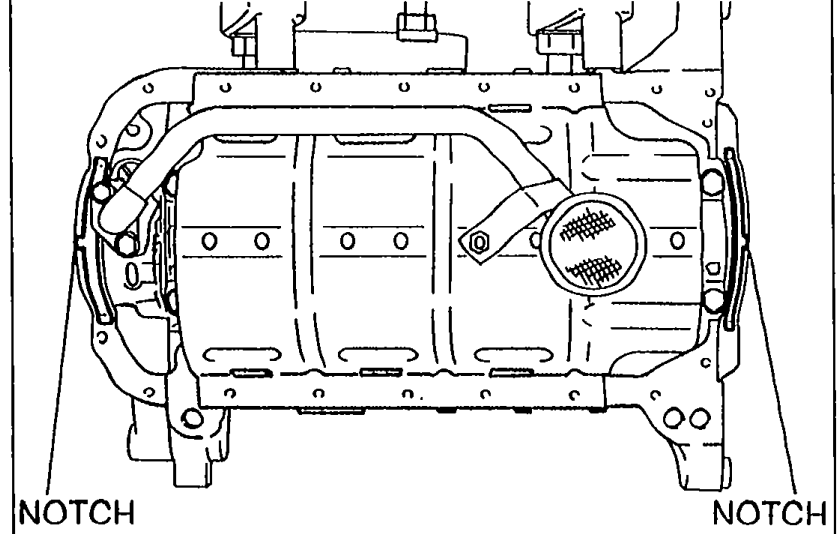 Top-down view of the cylinder block underside with new gaskets installed onto the oil pump body and rear cover. Two 'NOTCH' labels indicate where the gasket projections must engage.