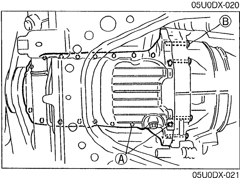 Photograph of the oil pan installed on the engine.