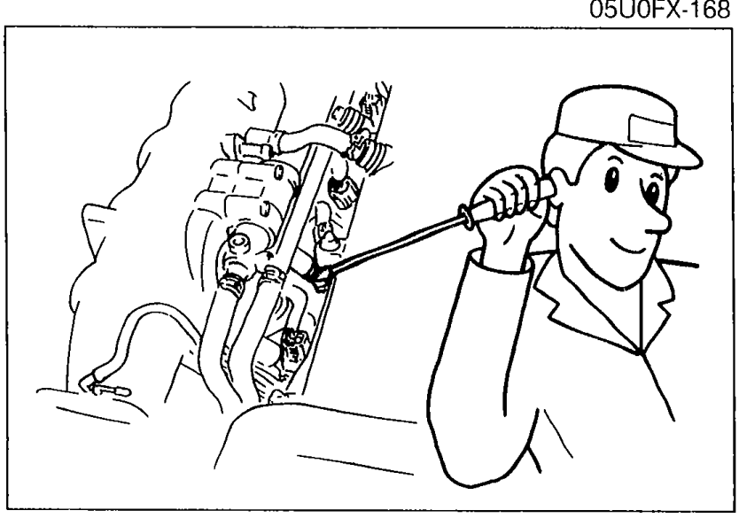 Illustration of a technician using a screwdriver against the injector body to listen for operational sound, an operational check of the injector.