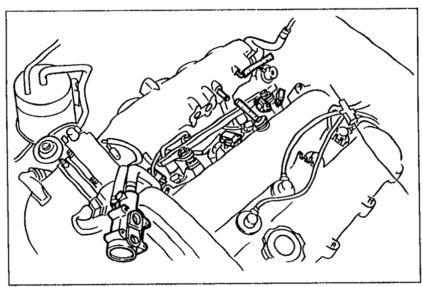Photo of the engine intake manifold area showing the injector area with vacuum hoses, PCV hose, air valve and injector connectors visible — relevant to removal steps.