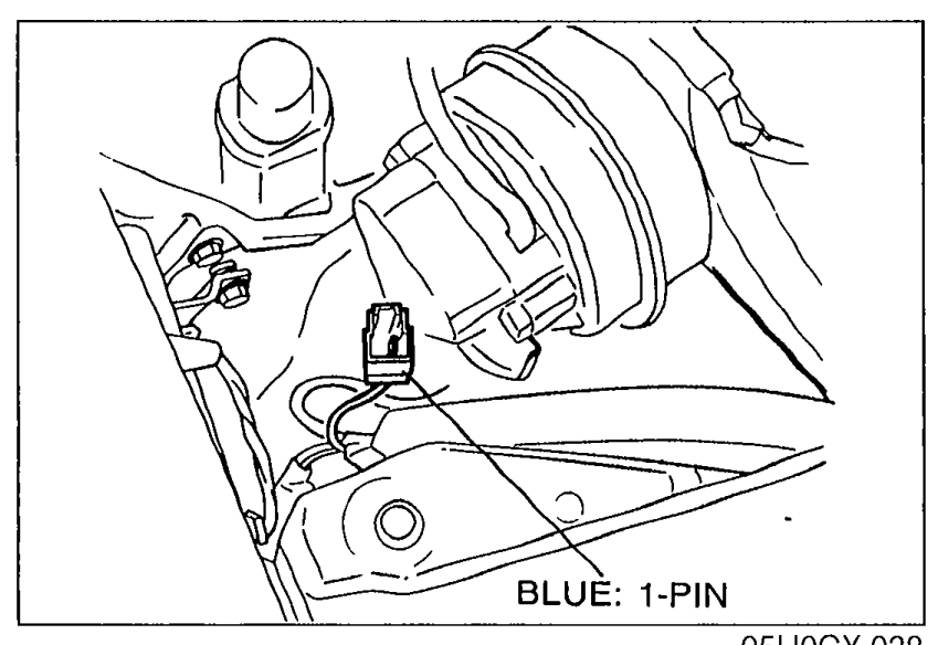 Engine bay photo showing the BLUE 1-PIN power connector used for an externally powered timing light/tachometer.