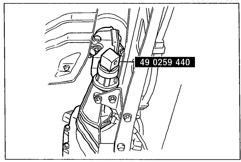Photo of the SST 49 0259 440 (Holder, mainshaft) installed in the transmission extension housing to prevent oil leakage after the propeller shaft is removed. The SST part number is labeled on the tool.