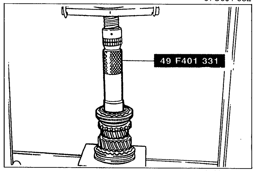 Pressing the 3rd/4th clutch hub assembly onto the mainshaft (with 3rd gear in place) using SST 49 F401 331.