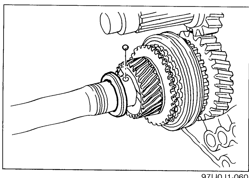 Mainshaft assembly with 5th gear showing the steel ball and thrust lock washer installation area.