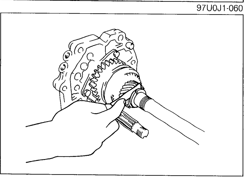 Measurement of clearance between thrust lock washer and C-washers (5th gear end play) using a feeler gauge on the mainshaft assembly.