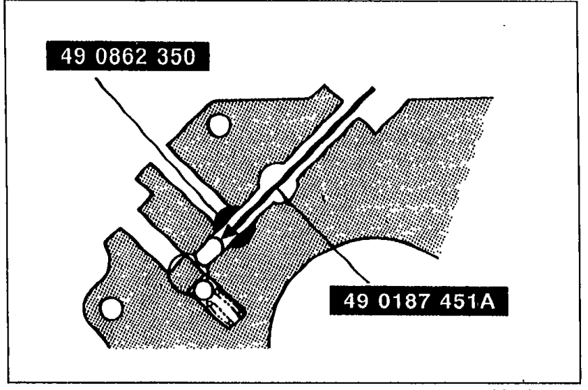 Close-up view verifying that the interlock pin is correctly installed, showing SSTs 49 0862 350 and 49 0187 451A in position.