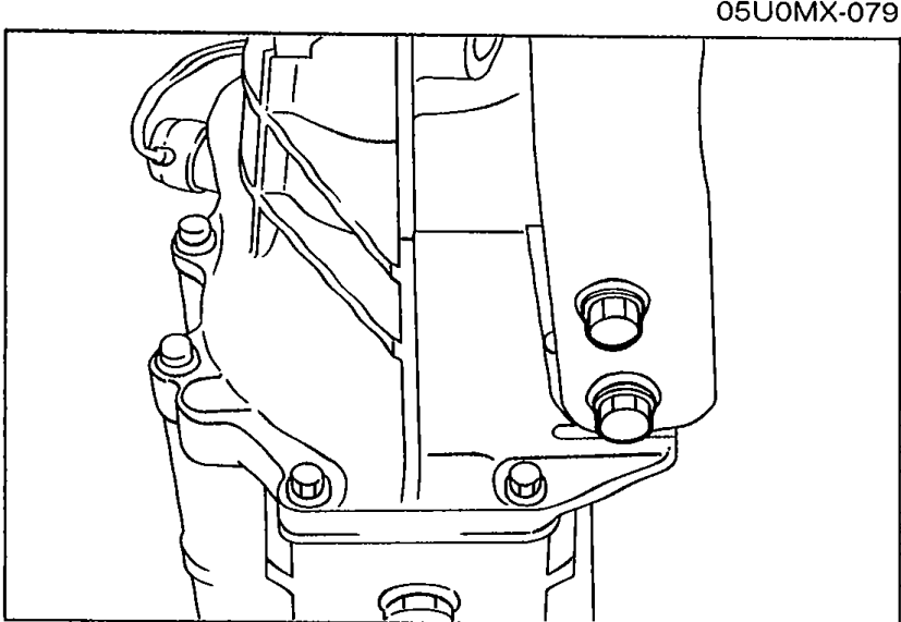 Photo of the power plant frame bracket installed at the transmission side, with the transmission-side bolts in place.