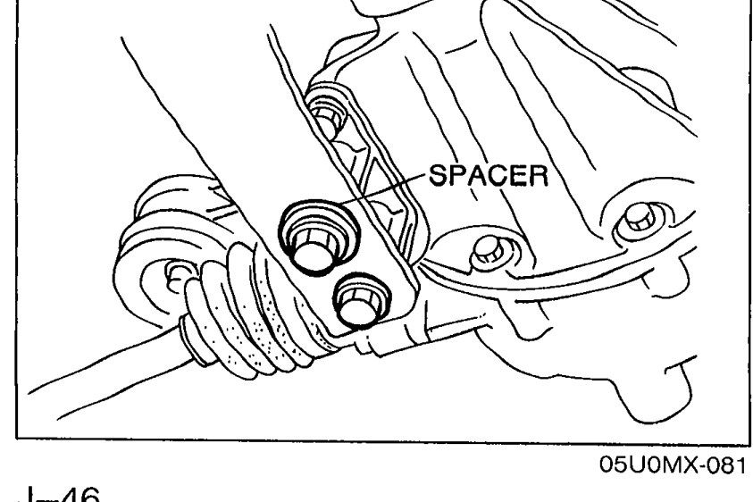 Photo of the differential-side bolts being tightened, with SPACER labelled.