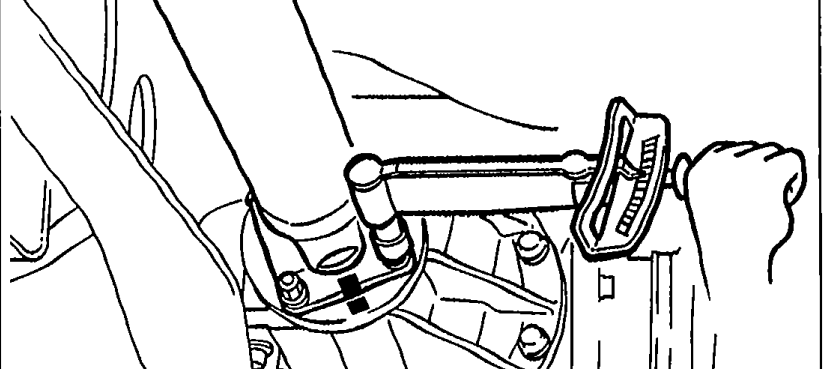 View under the vehicle showing the propeller shaft being aligned with the differential pinion flange with the alignment marks matched, and a hand holding it during installation.