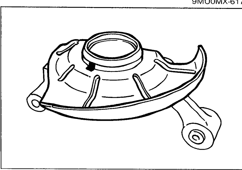 Photograph of the dust cover on the rear knuckle showing its orientation prior to removal.