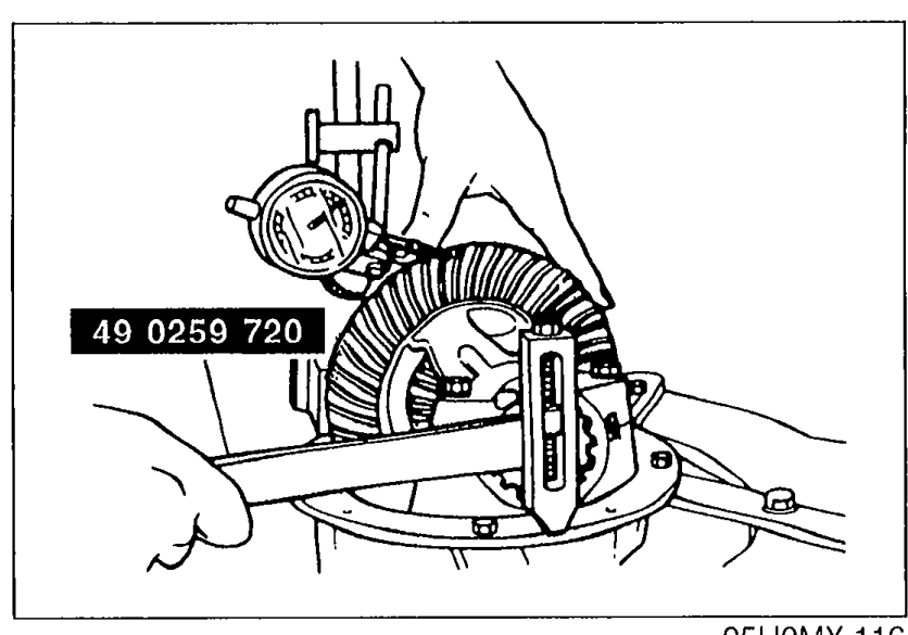 Photo showing SST 49 0259 720 being used to turn bearing adjusters on the differential carrier, with a dial indicator mounted to measure backlash.