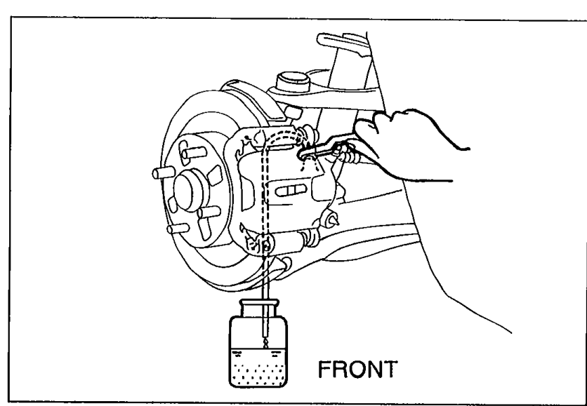 Front brake bleeder being air-bled. A hand grips the bleeder screw area with a vinyl tube routed downward to a clear container collecting brake fluid. Labeled 'FRONT'.