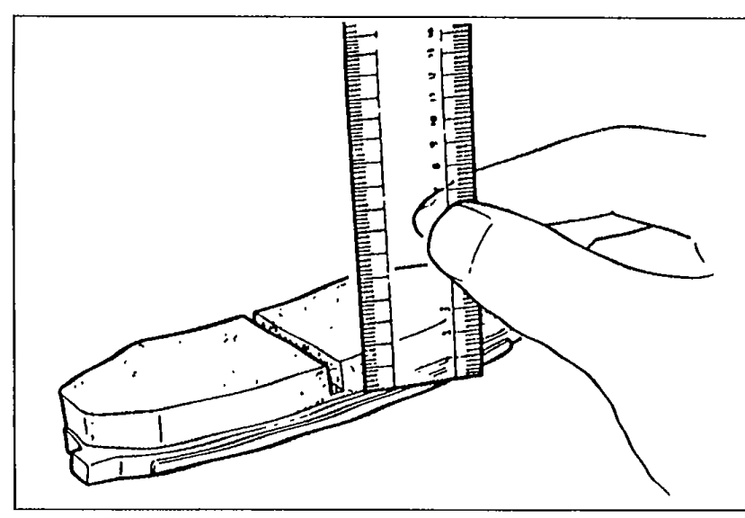 Illustration of measuring rear disc pad lining thickness with a vernier/scale gauge held against the pad surface.
