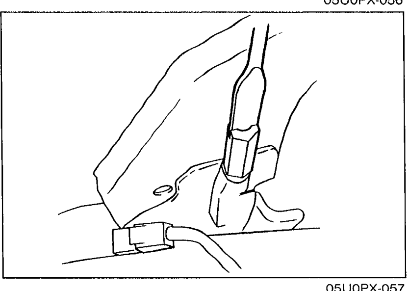 Illustration of a foot depressing the brake pedal with the parking brake lever visible, related to adjustment procedure.