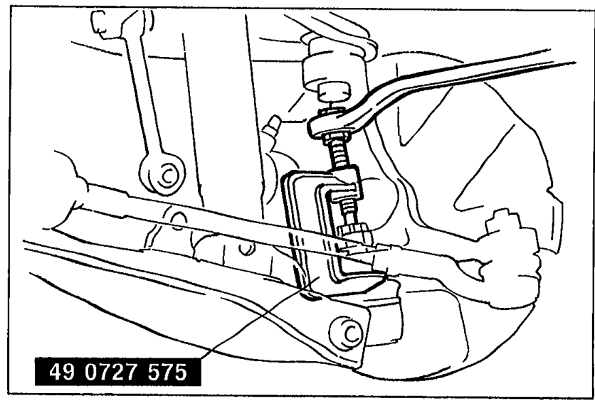 SST 49 0727 575 (Puller, socket joint) installed to separate the lower arm ball joint from the knuckle.