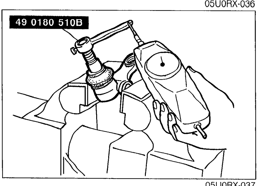 SST 49 0180 510B (Attachment) connected to the lower arm ball joint stud for rotation-torque measurement.