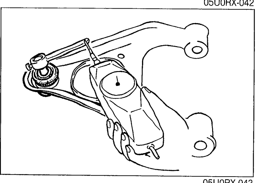 Upper arm with SST attachment connected to ball stud for rotation-torque measurement using a pull scale.