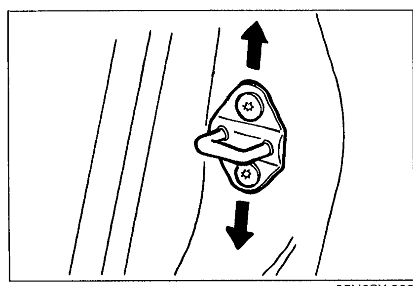 Illustration of the door lock striker mounted on the B-pillar with two screws, showing up/down arrows indicating vertical adjustment direction.