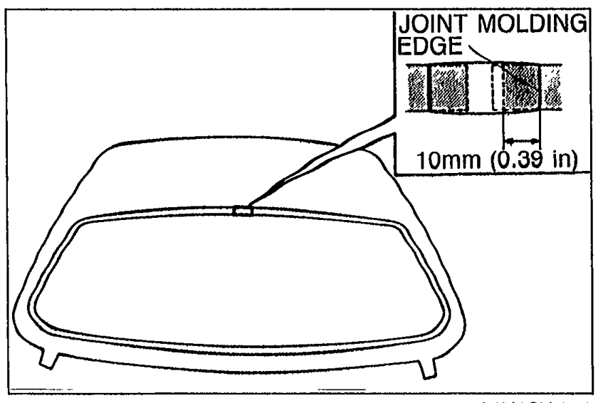 Detail showing the joint molding edge at the rear corner of the window, with a 10mm (0.39 in) callout indicating where to cut excess molding inside the joint molding edge.