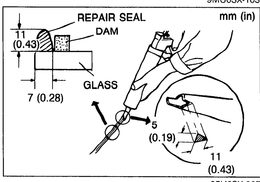 Sealant tube nozzle being applied between the DAM and the GLASS, forming the REPAIR SEAL bead. Dimensioned: nozzle V-flange width 0.43 in, sealant bead 11 mm (0.43 in) high, glass-to-dam gap 7 (0.28), small detail 5 (0.19).