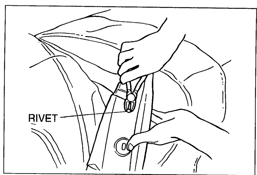 Close-up showing a rivet being cut from the rain rail with a hand cutter. Label: RIVET.