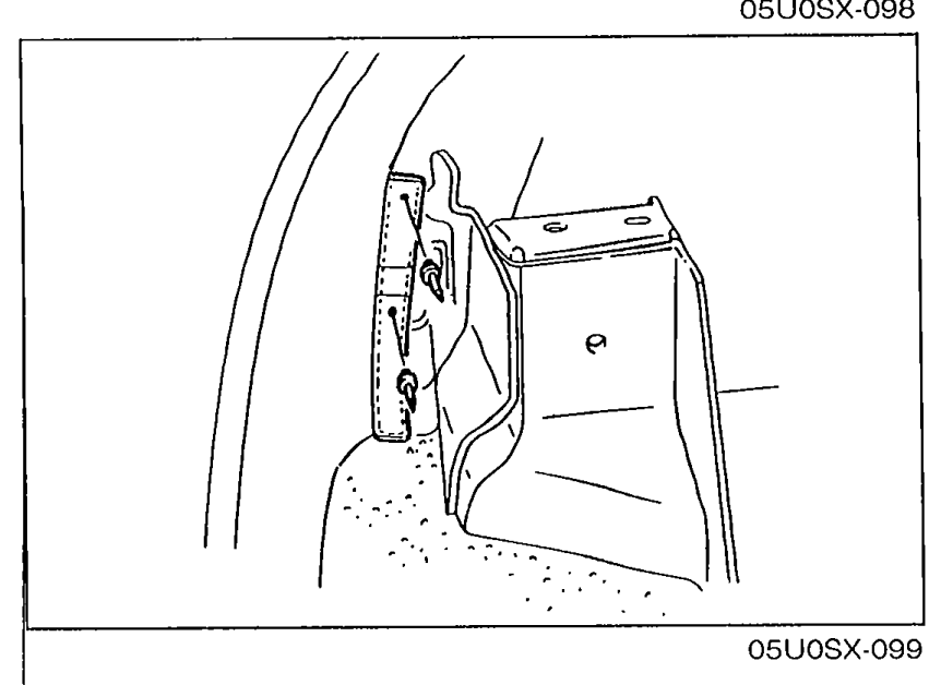 View of the convertible top latch area being closed and locked at the windshield header for the rear window install.