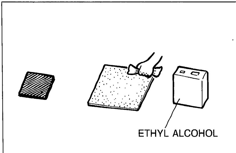 Illustration of a repair sheet, scissors, and a can of ETHYL ALCOHOL used for degreasing the repair sheets.