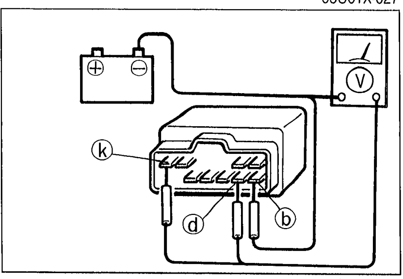 DRL unit with terminal b grounded; voltmeter measuring at terminals d and k.