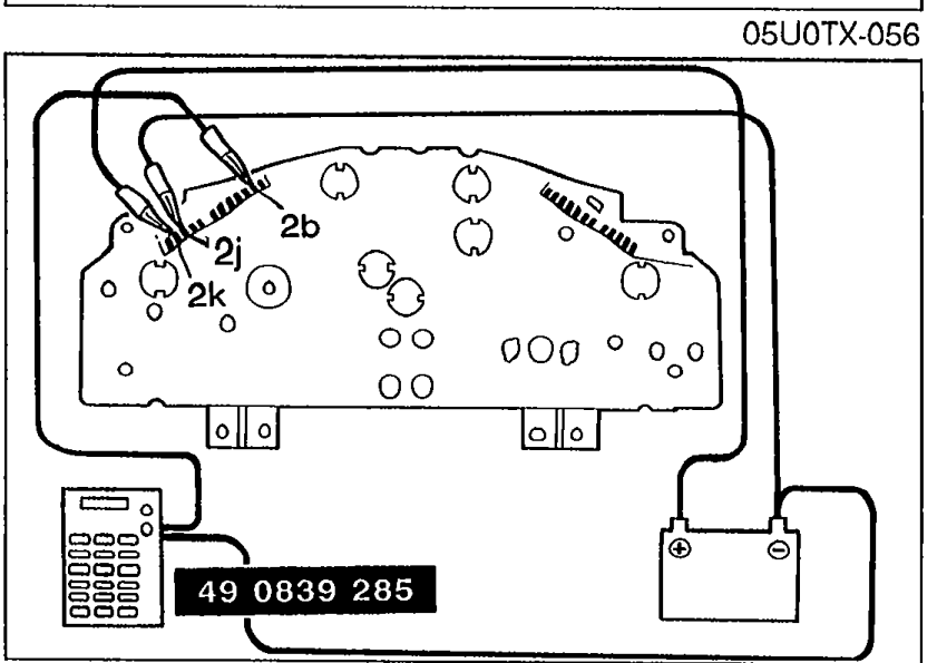 Instrument cluster rear view showing connection of SST 49 0839 285 to terminals 2k, 2j, and 2b with red and black leads, with 12V power and ground connections.