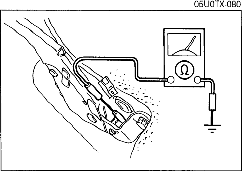 Photo of the parking brake switch with multimeter leads connected between the switch connector and a body ground for continuity checking.
