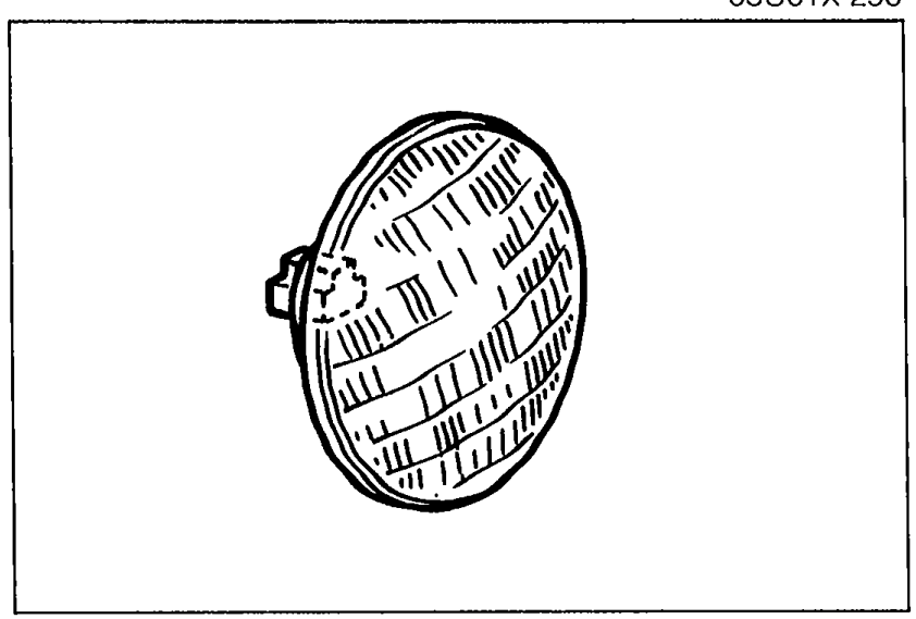 Photo of a sealed-beam headlight unit illustrating Step 2 (Check the headlight bulbs).