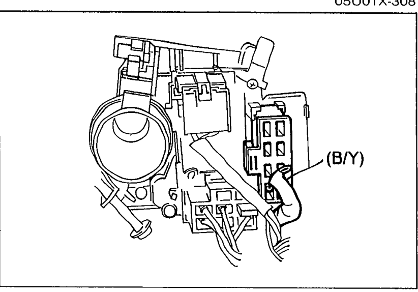 View of the turn-signal switch connector under the steering column with terminal-wire (B/Y) called out.