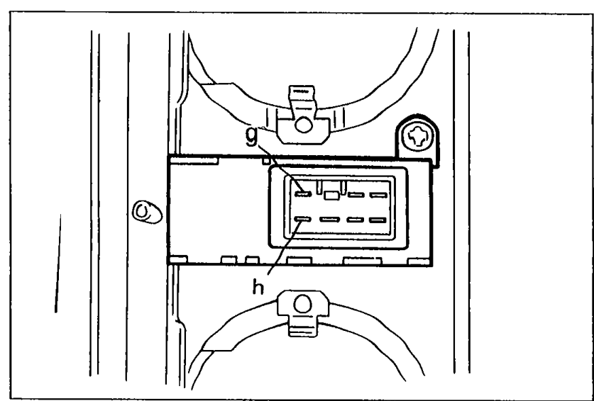 Hazard warning switch removed from the cluster panel, showing terminals labeled g and h on the back of the switch connector.