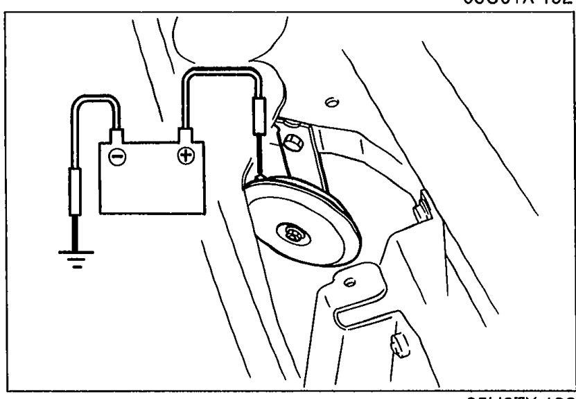 Photo of the horn unit installed on its bracket, showing the connector.