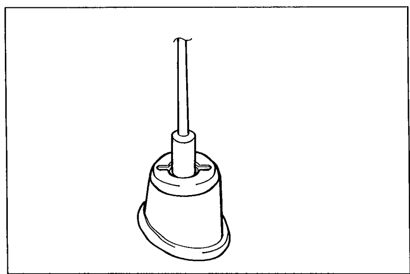 Antenna base / mounting nut illustration showing the antenna mast inserted into its base.