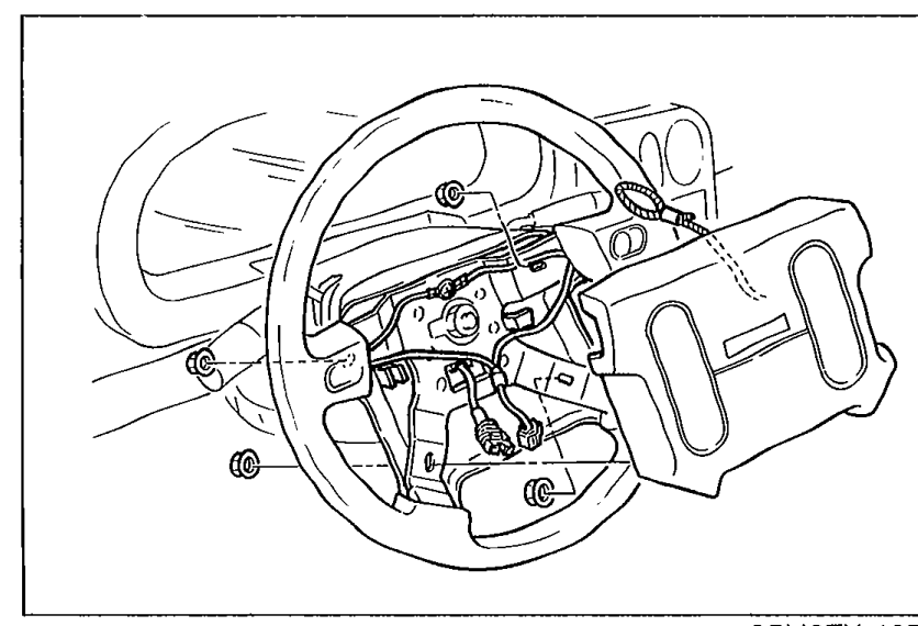 Steering wheel with the air bag module removed, exposing the mounting structure. Shows the position of the air bag module on the steering wheel.