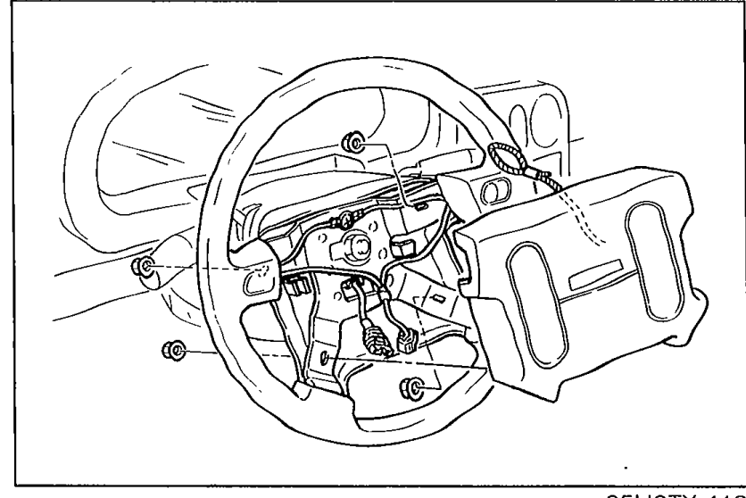 Steering wheel with the air bag module removed showing the mounting points. Same view as previous page illustrating step 3 (install in reverse order).