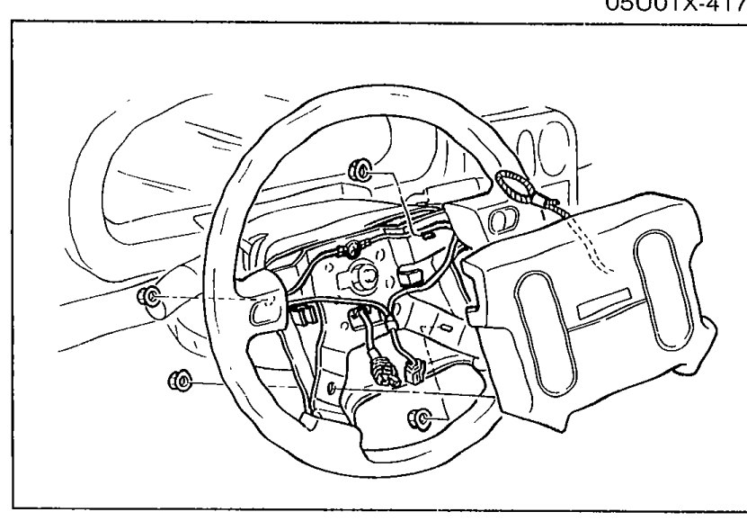 Steering wheel with the air bag module removed showing the mounting structure for removal of the nuts and air bag module (refer to T-150).