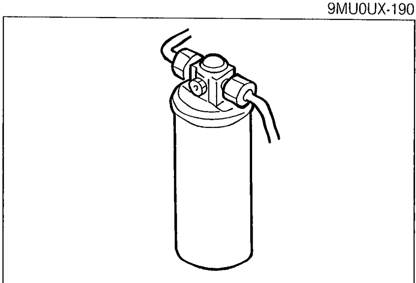 Close-up of the receiver/drier cylindrical bottle with its inlet/outlet fittings at the top, illustrating the receiver/drier on-vehicle inspection procedure.